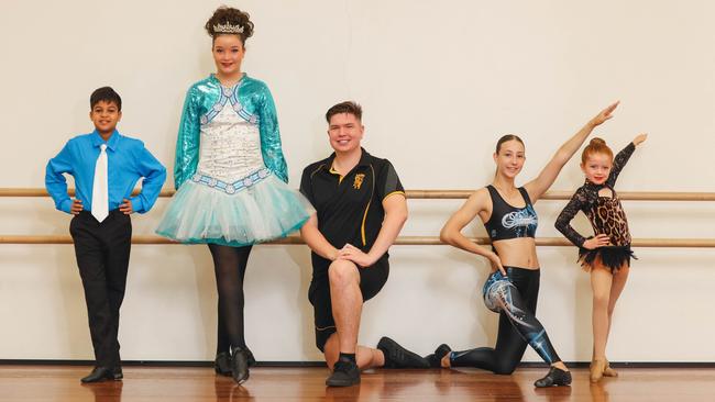 From, left, Paul Davey, 10, Daniela Ovado, 14, and Fletcher Austin from the Keltikka Performance Dance Company, and Rebekah Williams and Chloe Baylis from the Darwin Performance Academy. Both dance schools received more than 500 votes in the Territory’s Favourite Dance School poll. Picture: Glenn Campbell