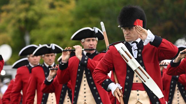 Fife and drum band knock out a tribute to Mark Milley. Picture: AFP