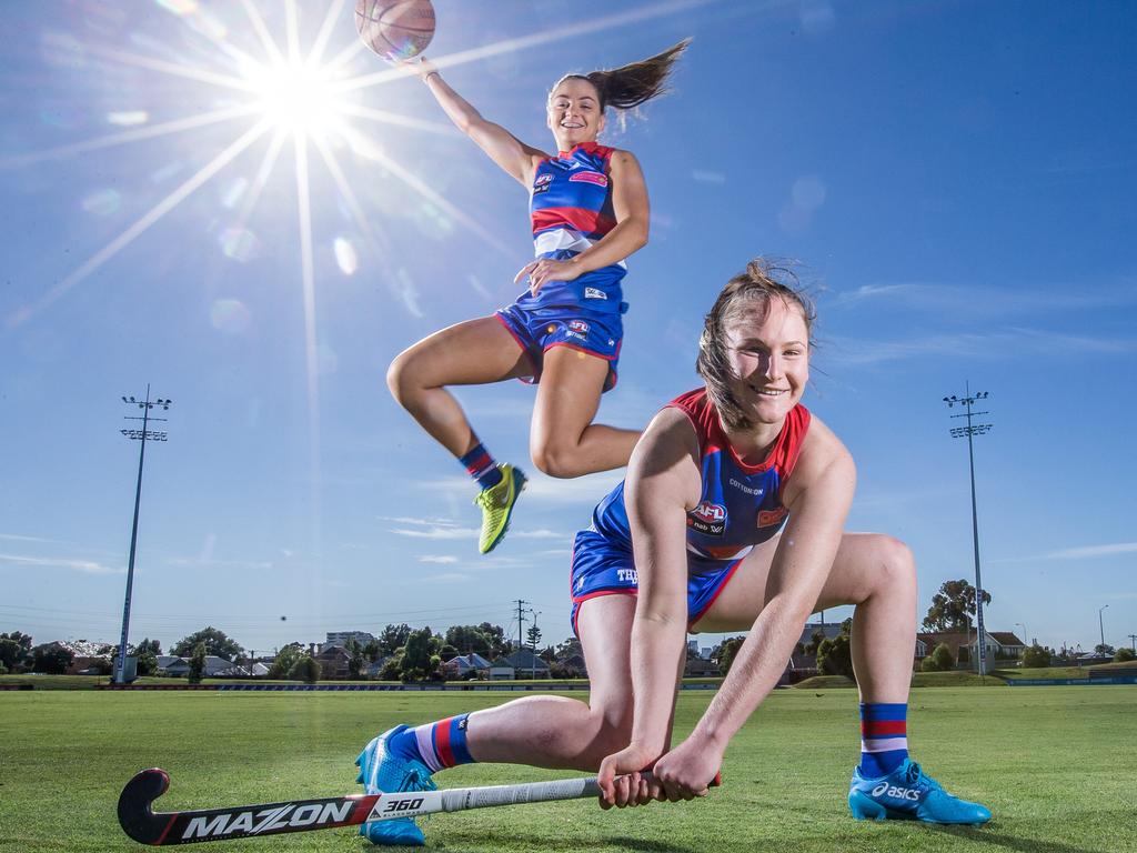 Ash Utri, with Western Bulldogs premiership teammate Mon Conti. Picture: Tim Carrafa