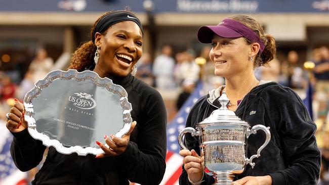 Sam Stosur celebrates her 2011 US Open championship with runner-up Serena Williams. Picture: Getty Images