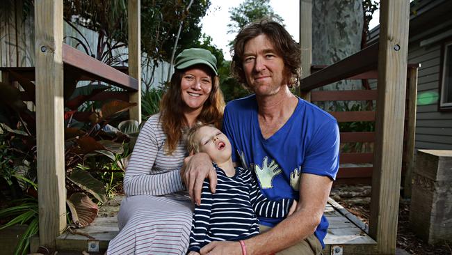 Ina Mills and David Mills with their son Roki (5) at their new home in Newport. Picture: Adam Yip / Manly Daily