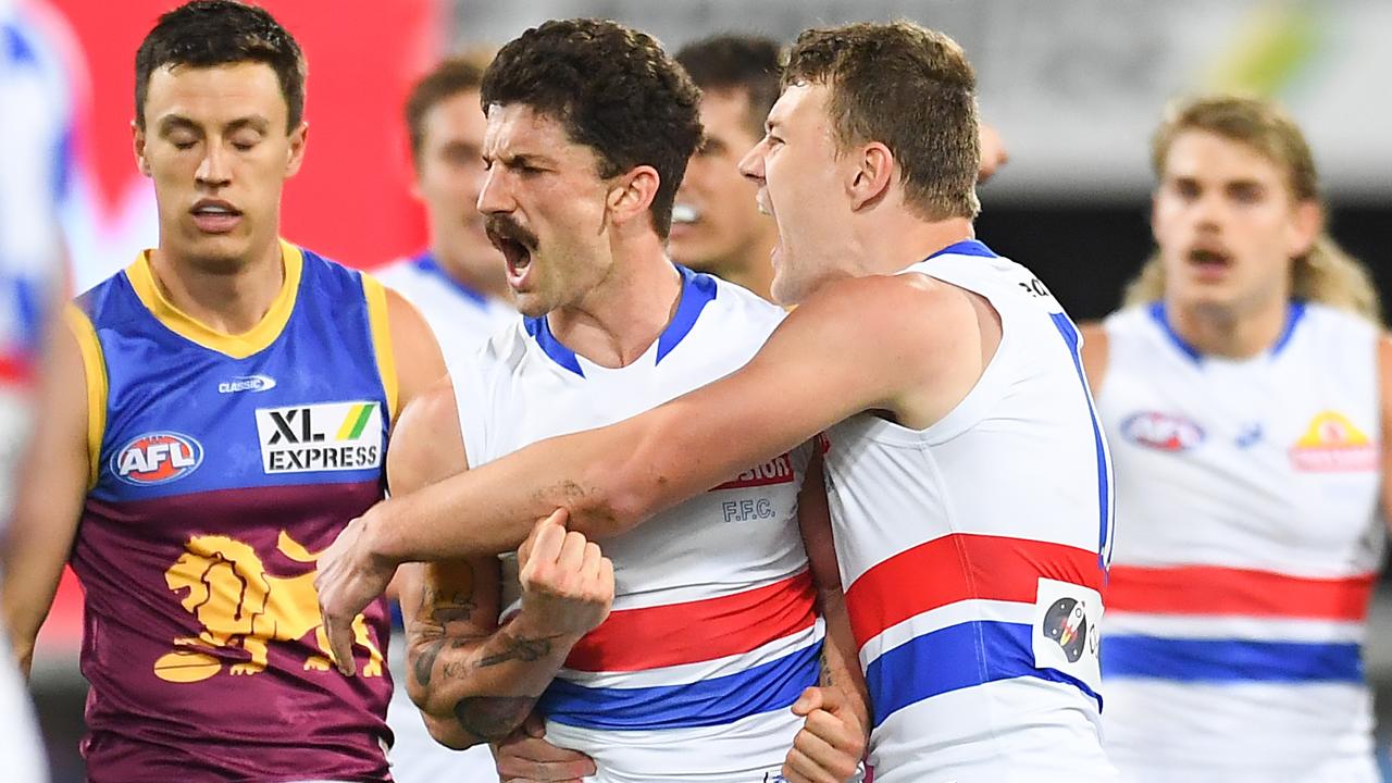 The Western Bulldogs will face the Port Adelaide Power in one preliminary final, while Geelong faces Melbourne in the other. (Photo by Albert Perez/AFL Photos via Getty Images)