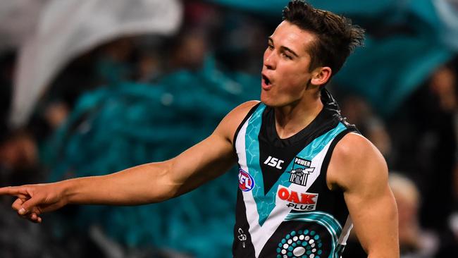 Connor Rozee of the Power celebrates after kicking a goal during the round 14 AFL match against the Cats at Adelaide Oval.