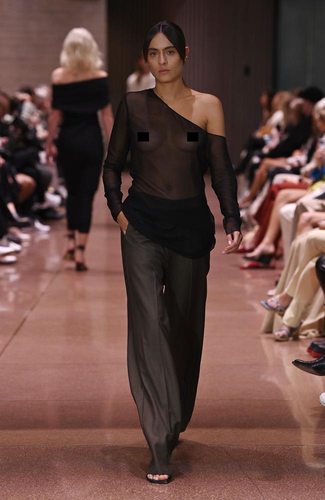 One model wore this completely sheer off the shoulder top. Picture: Stefan Gosatti/Getty Images