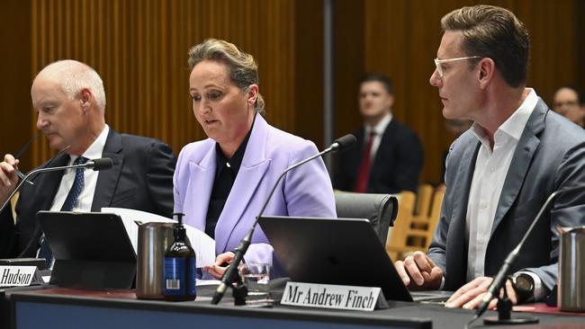 Qantas chairman Richard Goyder, CEO Vanessa Hudson and Qantas general counsel Andrew Finch front the Senate inquiry in Canberra. Picture: NCA NewsWire/Martin Ollman