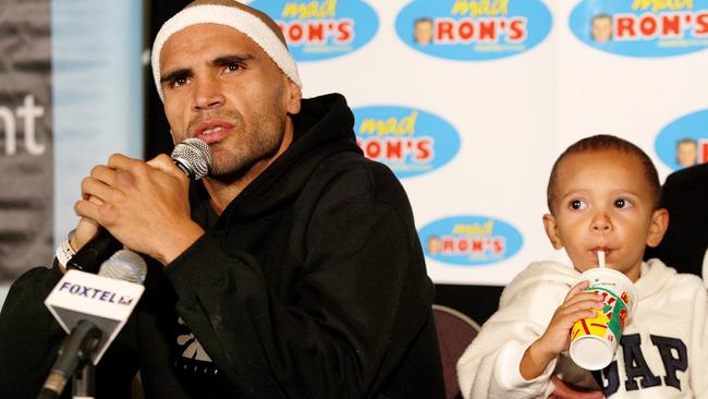 Australian boxer Anthony Mundine and his son Rahim in 2004. AFP PHOTO/William WEST.