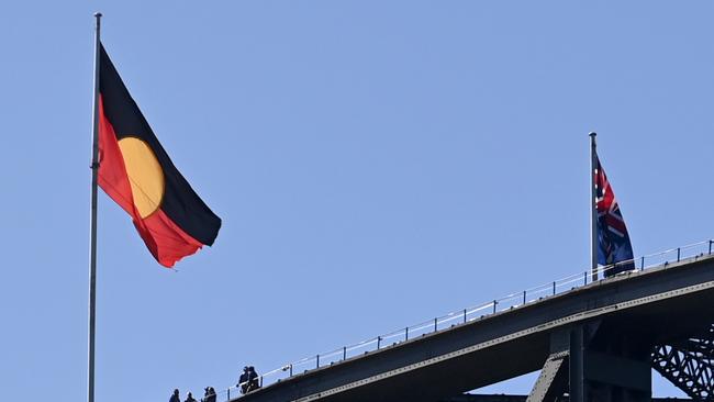 The Aboriginal and Australian flags fly on top of the Sydney Harbour Bridge. Picture: NCA NewsWire/Jeremy Piper