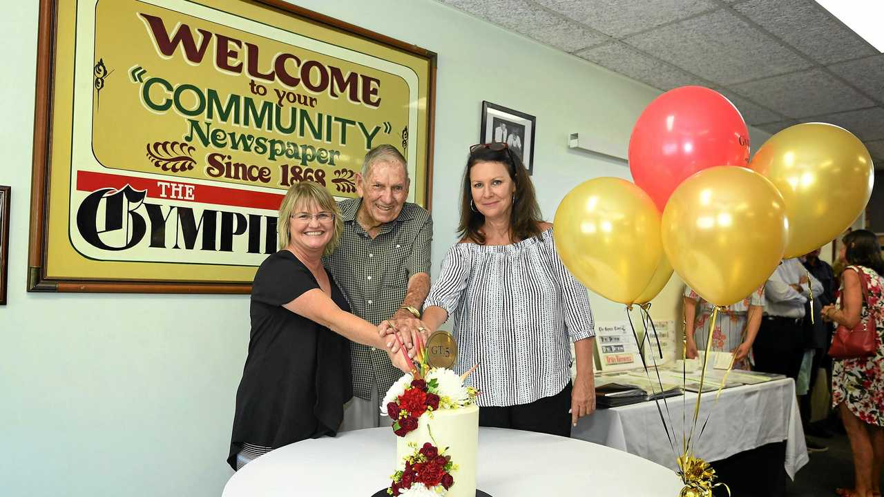 MILESTONE:  The Gympie Times  General Manager Tracey McKean , former long-term employee Jim Saunders and Editor Shelley Strachan cut the delicious 150th anniversary white chocolate mud cake yesterday made by Jessie & Co, the flowers by Branch & Blossom. Picture: Renee Albrecht