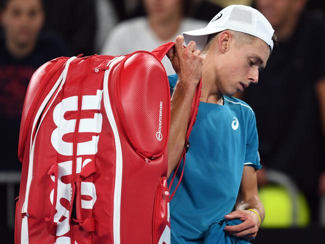 Alex De Minaur, dubbed “Little Lleyton”, makes his departure after a devil of a day. Picture: AAP