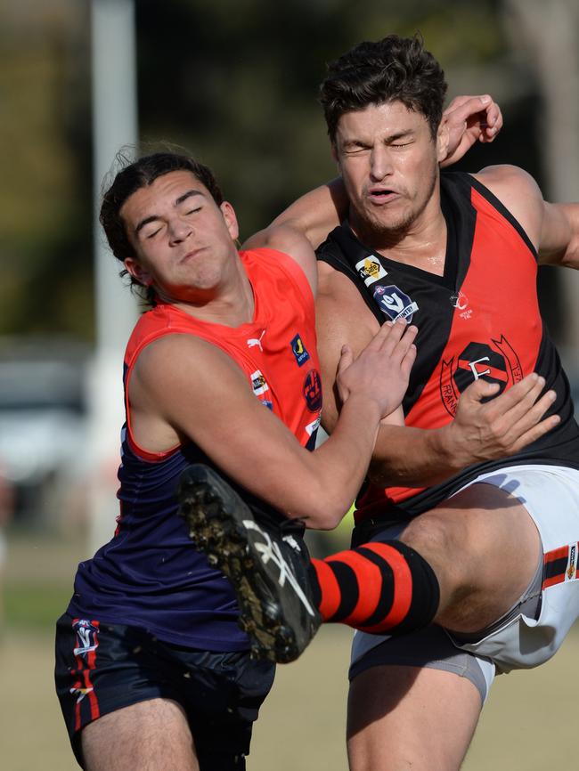 MPNFL Div 1: Mt Eliza v Frankston Bombers at Emil Madsen Reserve. Mt Eliza #49 Luca Goonan tackles Bombers # 26 Corey Micari. Picture:AAP/ Chris Eastman