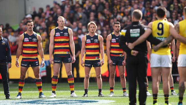 The Crows stare during the anthem. Picture. Phil Hillyard