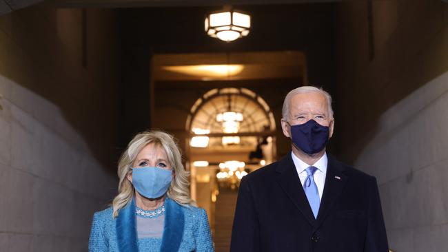 WASHINGTON, DC - JANUARY 20: U.S. President-elect Joe Biden and Jill Biden arrive at his Biden's inauguration on the West Front of the U.S. Capitol on January 20, 2021 in Washington, DC.  During today's inauguration ceremony Joe Biden becomes the 46th president of the United States. (Photo by Win McNamee/Getty Images)