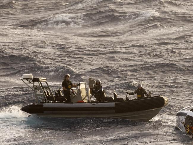 HMAS Choules rescues a solo rowboat adventurer off the east Australian coast. *** Local Caption *** On 01 March 2025, Defence accepted a request from the Australian Maritime Safety Authority (AMSA) to support a search and rescue operation approximately 740km east of Mackay, QLD, after concerns were raised for the safety of a solo occupied rowboat. The vessel is in close proximity to Severe Tropical Cyclone Alfred. Defence has dispatched a Royal Australian Air Force P-8A Poseidon aircraft from RAAF Base Edinburgh in South Australia, and the Royal Australian Navy ship HMAS Choules from Brisbane to assist in the AMSA âled operation.