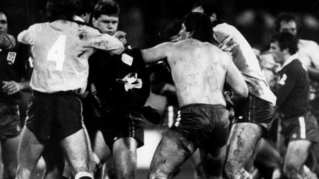 Maroons prop Paul Vautin, centre, is about to take evasive action as teammate Chris Close lines one up at the SCG in June 1984. Picture: News Limited Rugby League