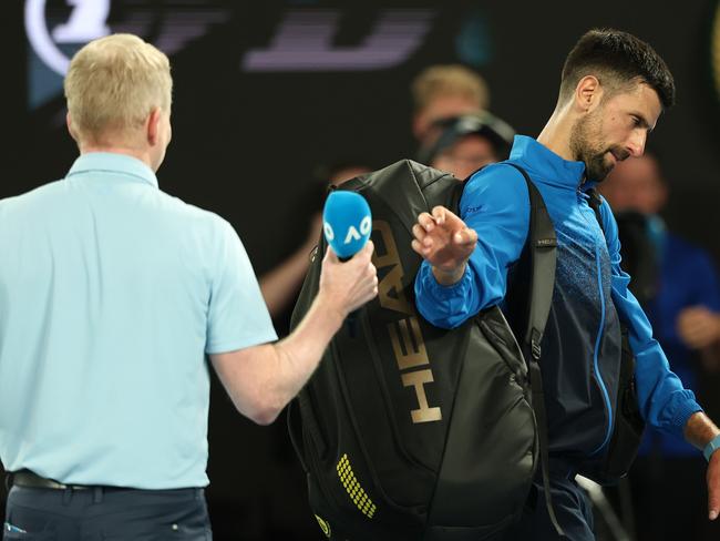 MELBOURNE, AUSTRALIA - JANUARY 19: Novak Djokovic of Serbia leaves Rod Laver Arena after speaking to the crowd following victory against Jiri Lehecka of the Czech Republic in the Men's Singles Fourth Round match during day eight of the 2025 Australian Open at Melbourne Park on January 19, 2025 in Melbourne, Australia. (Photo by Cameron Spencer/Getty Images)