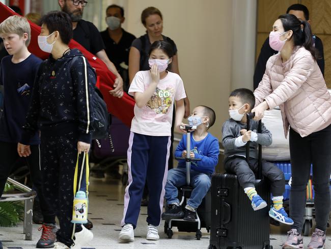 Masks at Sydney  Airport. People Wearing Masks Re Coronavirus. Pic Chris Pavlich