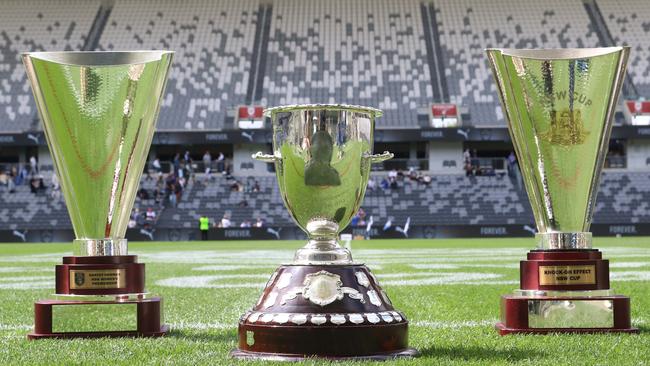 (L-R) Harvey Norman Women’s Premiership Cup, Jersey Flegg Cup and NSW Cup. Picture Warren Gannon Photography