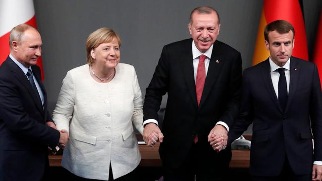 (From L) Russian President Vladimir Putin, German Chancellor Angela Merkel, Turkish President Recep Tayyip Erdogan and French President Emmanuel Macron.