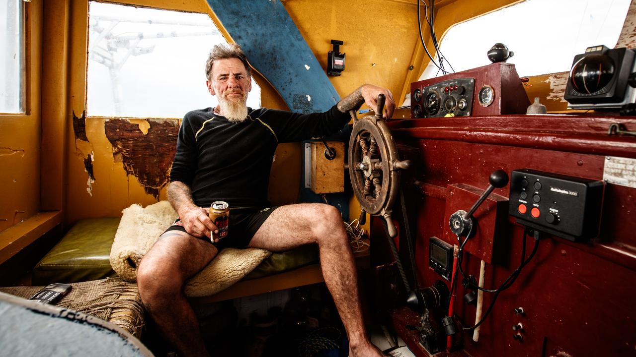 Tony Higgins on his boat at Victor Harbor, South Australia, after his four-day ordeal. Picture: Matt Turner