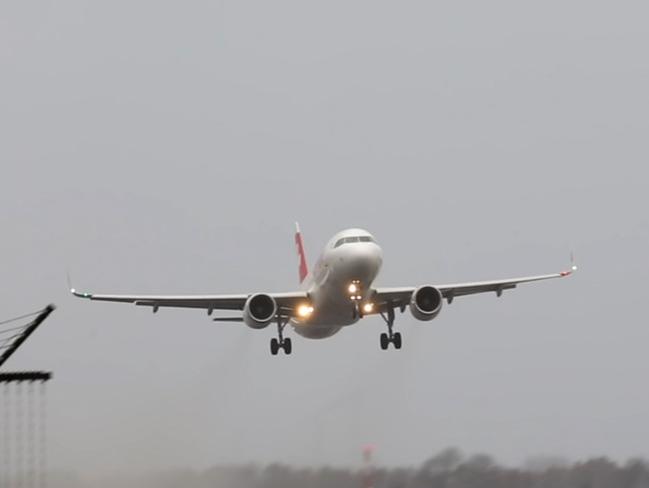 The pilot changes his mind and pulls the plane away. Picture: Michael Splinter via Storyful