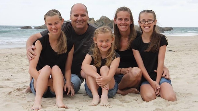 Jason Boys, with his wife and three daughters, saves $160 a month by switching telcos.