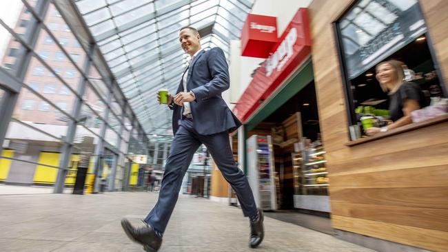 Worker Craig Schloeffel grabs a quick coffee at Southbank. Picture: Tim Carrafa