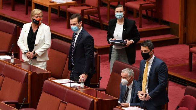 Nationals senators Matt Canavan, Sam McMahon and Liberal senators Concetta Fierravanti-Wells, Gerard Rennick and Alex Antic are seen in the senate chamber after voting for One Nation leader Senator Pauline Hanson’ vaccine discrimination bill. Picture: AAP