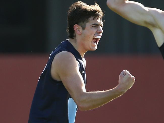 MELBOURNE, VICTORIA - JUNE 24:  Patrick Naish of Vic Metro celebrates a goal during the U18 Championship match between Vic Metro and Vic Country at Punt Road Oval on June 24, 2017 in Melbourne, Australia.  (Photo by Robert Prezioso/AFL Media/Getty Images)
