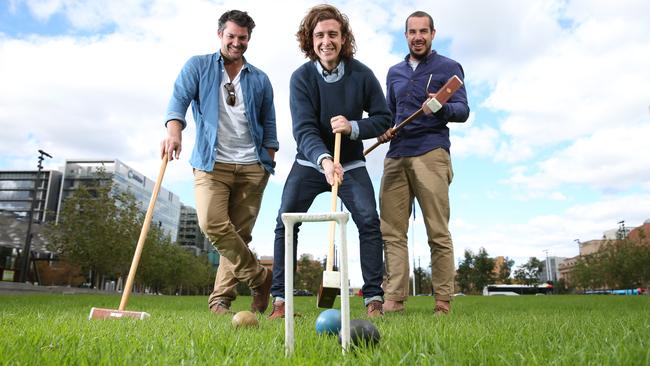 Tom Skipper, Stuart Duckworth and Sam Weckert from the Royal Croquet Club in Victoria Square. Picture: Calum Robertson