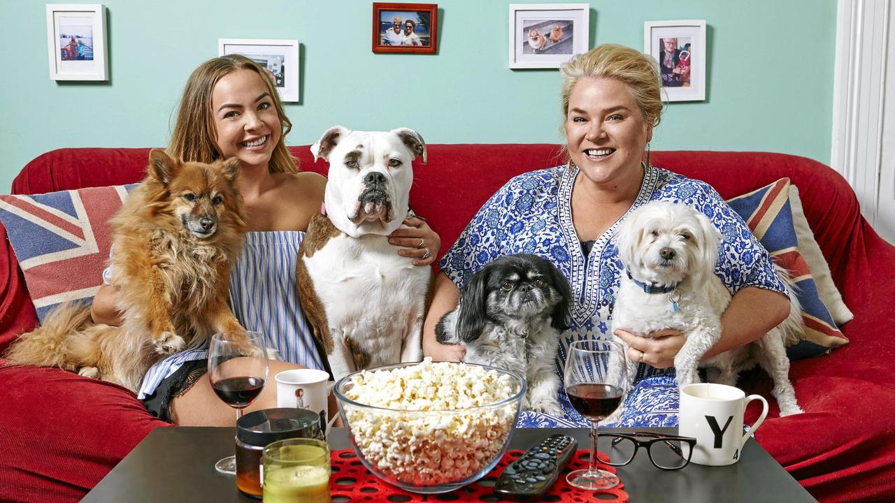 Former Gogglebox stars Angie Kent and Yvie Jones with just a handful of the dogs they have rehomed.