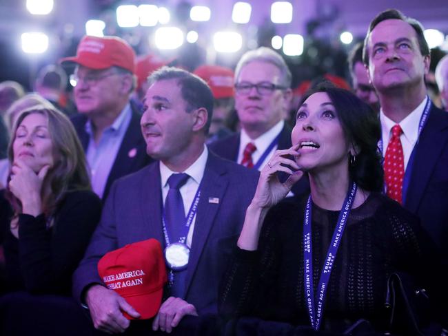 Supporters of Republican presidential nominee Donald Trump gather during the election night event at the New York Hilton Midtown on November 8, 2016 in New York City. Americans today will choose between Republican presidential nominee Donald Trump and Democratic presidential nominee Hillary Clinton as they go to the polls to vote for the next president of the United States. Chip Somodevilla/Getty Images/AFP == FOR NEWSPAPERS, INTERNET, TELCOS & TELEVISION USE ONLY ==
