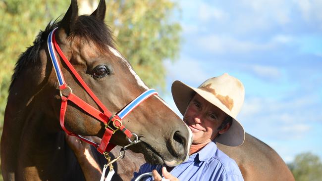 Trainer Gary Clarke with Java after winning the 2020 Alice Springs Chief Minister's Cup at Pioneer Park. Picture: Nikki Westover