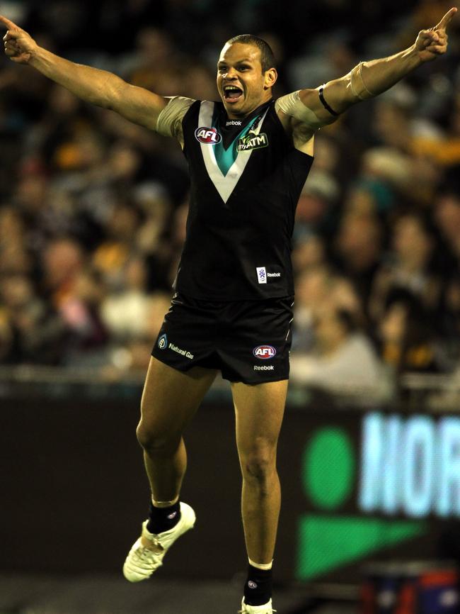 Former Port Adelaide forward Daniel Motlop pictured celebrating after kicking a goal during the Power’s game with Hawthorn in 2011. Picture: News Corp.