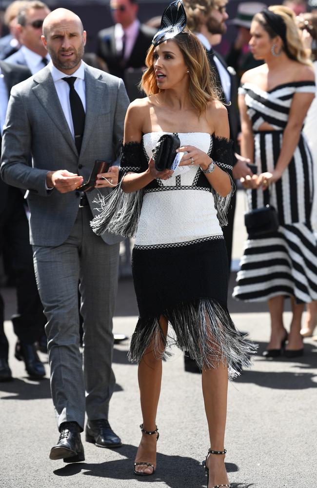 Chris and Rebecca Judd are seen at the Birdcage on Victoria Derby Day. Picture: James Ross, AAP Image.
