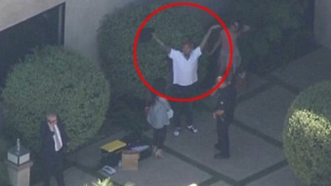 Chris Brown surrenders after a standoff with police. Picture: KTLA