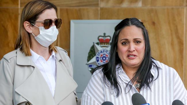 Victim Jacquelyn and her friend speak to police about a brutal assault outside Box Hill police station. Picture: Tim Carrafa