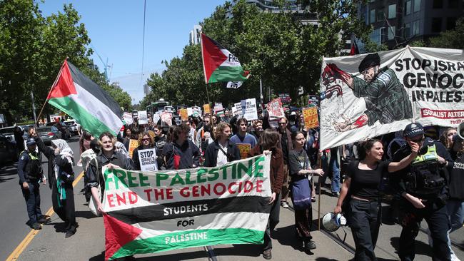 A student protest calling for Israel to end the war in Palestine held at the American Consulate in Melbourne marches down St Kilda Road. Picture: NCA NewsWire / David Crosling