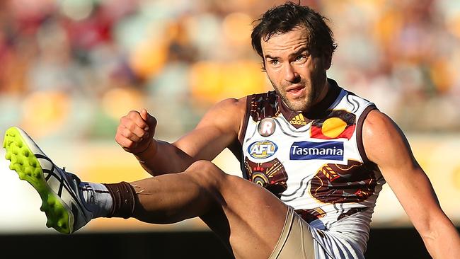 Jordan Lewis starred in his 250th AFL game as Hawthorn escaped the Gabba with a win over Brisbane.