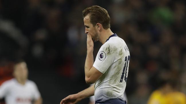 Tottenham Hotspur's Harry Kane walks from the pitch after the end of the English Premier League soccer match between Tottenham Hotspur and Wolverhampton Wanderers at Wembley stadium in London, Saturday, Dec. 29, 2018. wolves won the match 3-1.(AP Photo/Kirsty Wigglesworth)