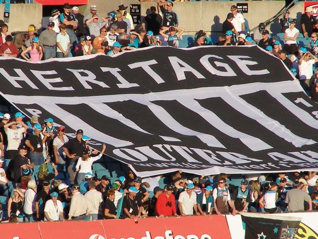 The AFL has stopped the Port Adelaide Football Club from wearing it's black-and-white striped heritage guernsey in the 2007 Heritage Round. We at the Outer Army (supporter's group of the PAFC) have made a Heritage Crowd Banner which took over 250 man hours to make.