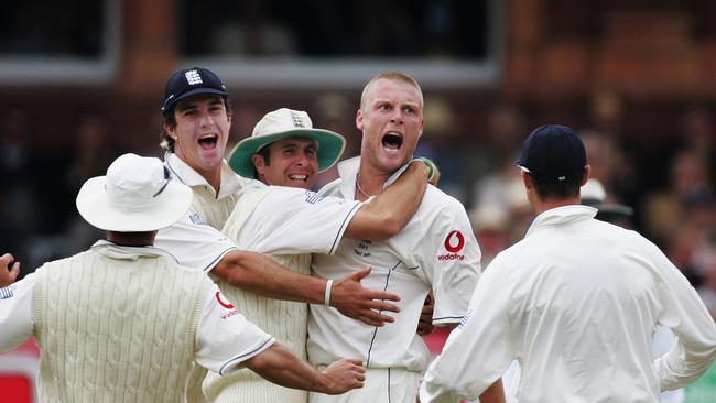 Phil Hillyard pictures – The Ashes 2005 – 1st Test – Australia v England at Lord's. Andrew Flintoff is embraced by captain Michael Vaughan as he celebrates dismissing Adam Gilchrist, caught behind for 26.