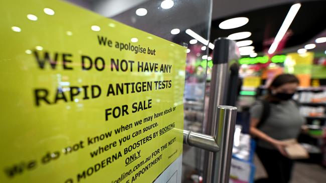 A sign on the front door of a pharmacy informing customers that RAT tests are unavailable. Picture: NCA NewsWire / Dan Peled