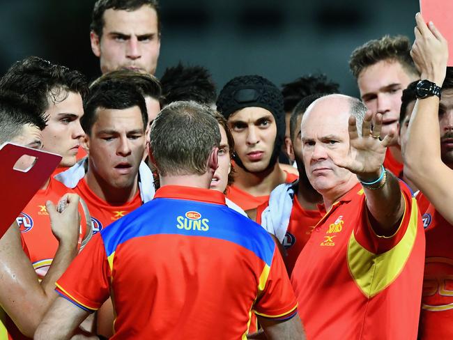 CAIRNS, AUSTRALIA - JULY 22:  Suns head coach Rodney Eade talks to his players  during the round 18 AFL match between the Western Bulldogs and the Gold Coast Suns at Cazaly's Stadium on July 22, 2017 in Cairns, Australia.  (Photo by Quinn Rooney/Getty Images)