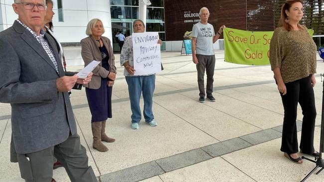 Gold Coast community leaders outside the Evandale Chambers at a full council meeting. They were raising issues of closed meetings, City Plan and sewer leak.