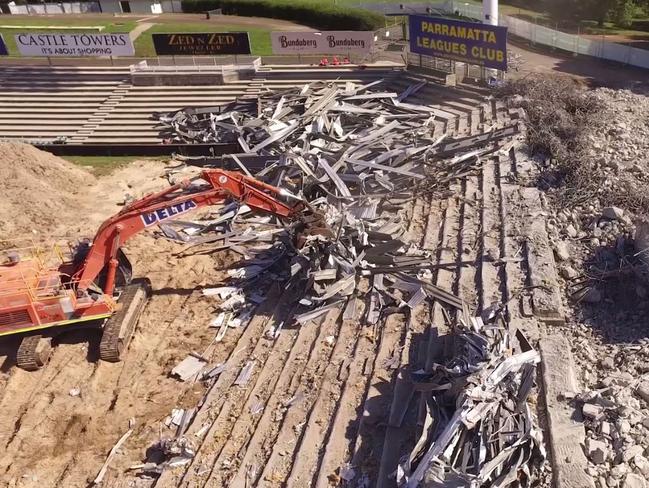 Footage shows drones working to dislodge concrete and seating.