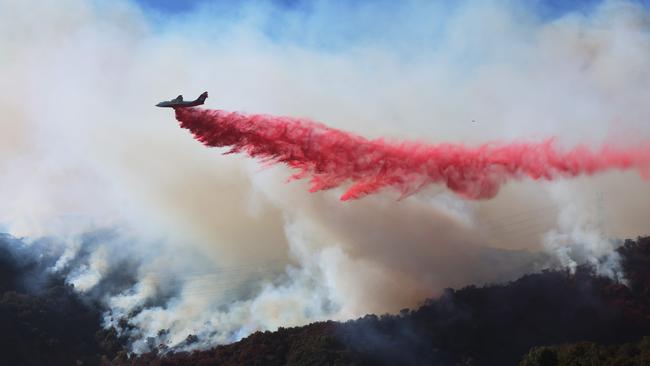 Retardant is dropped as the Palisades Fire grows near Encino Hills, California. Picture: AFP