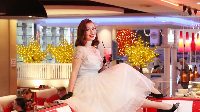 Lulu Doughty is a 20 year old uni student who dresses in vintage clothes 24/7. Ms Doughty's enjoys a shake at the Pancake Diner in Coolangatta as Cooly Rocks On tickets go on sale. Picture Glenn Hampson