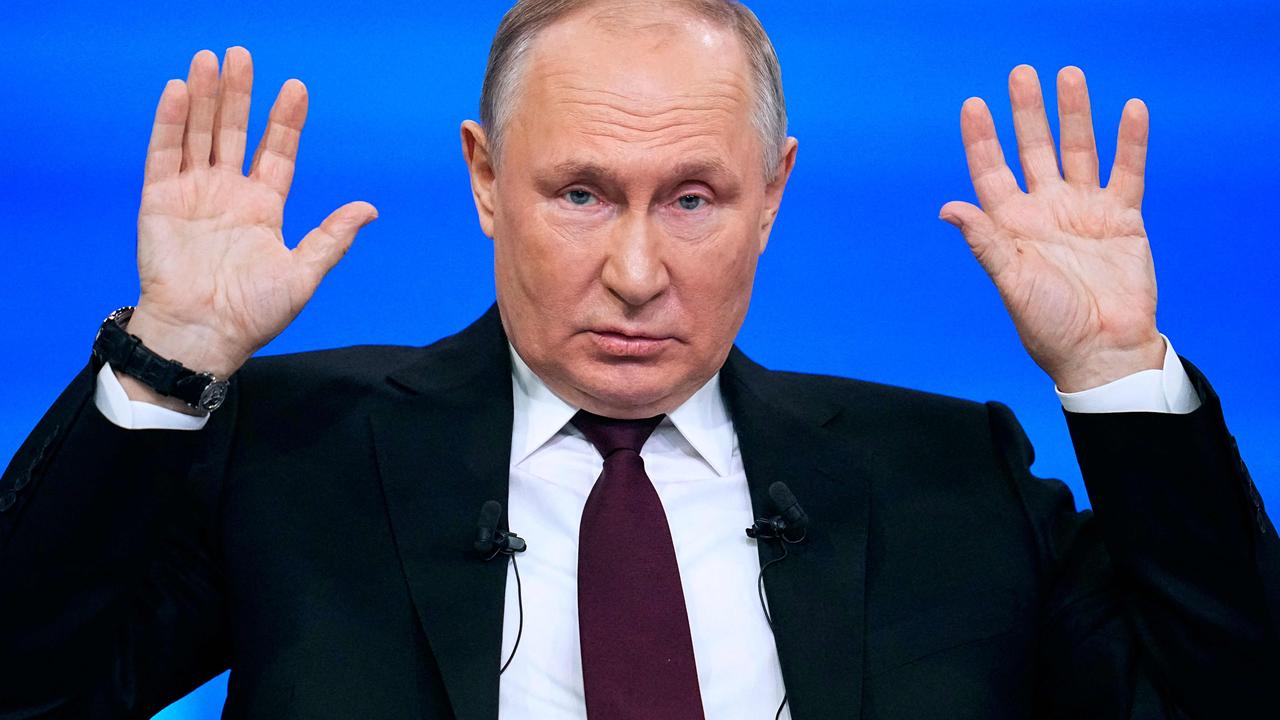 Vladimir Putin, doing an “it wasn’t me” pose. Picture: Alexander Zemlianichenko/AFP