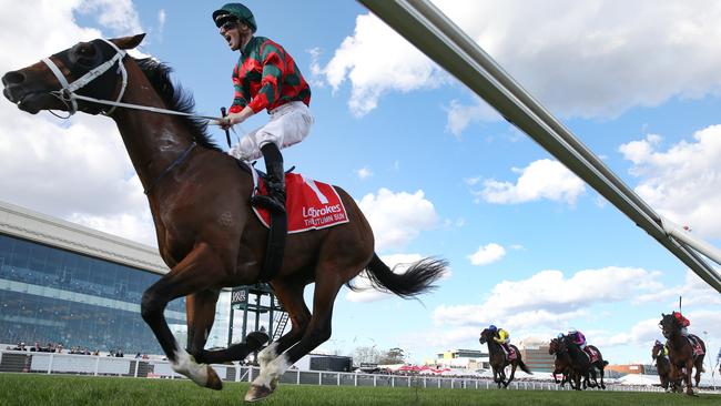 The Autumn Sun, ridden by James McDonald, easily wins the Caulfield Guineas. Picture: Michael Klein