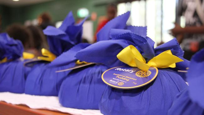 Alice Springs Rotary Club donated Christmas puddings. Picture: Gera Kazakov